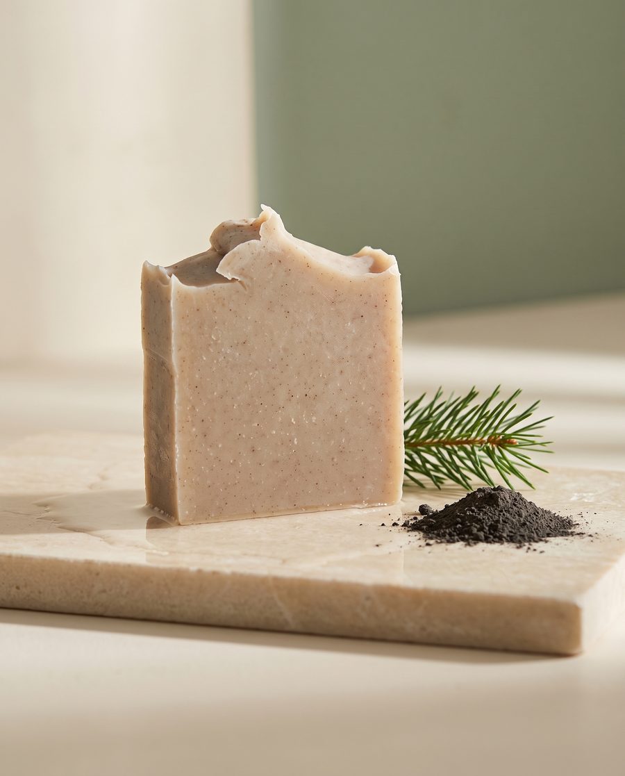 Mystic Pines soap bar with a pine sprig and lava clay